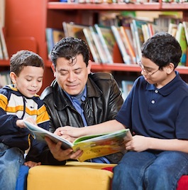 dad reading with kids